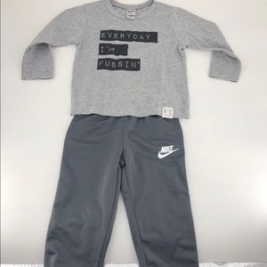Long sleeve graphic tee and Nike track pants